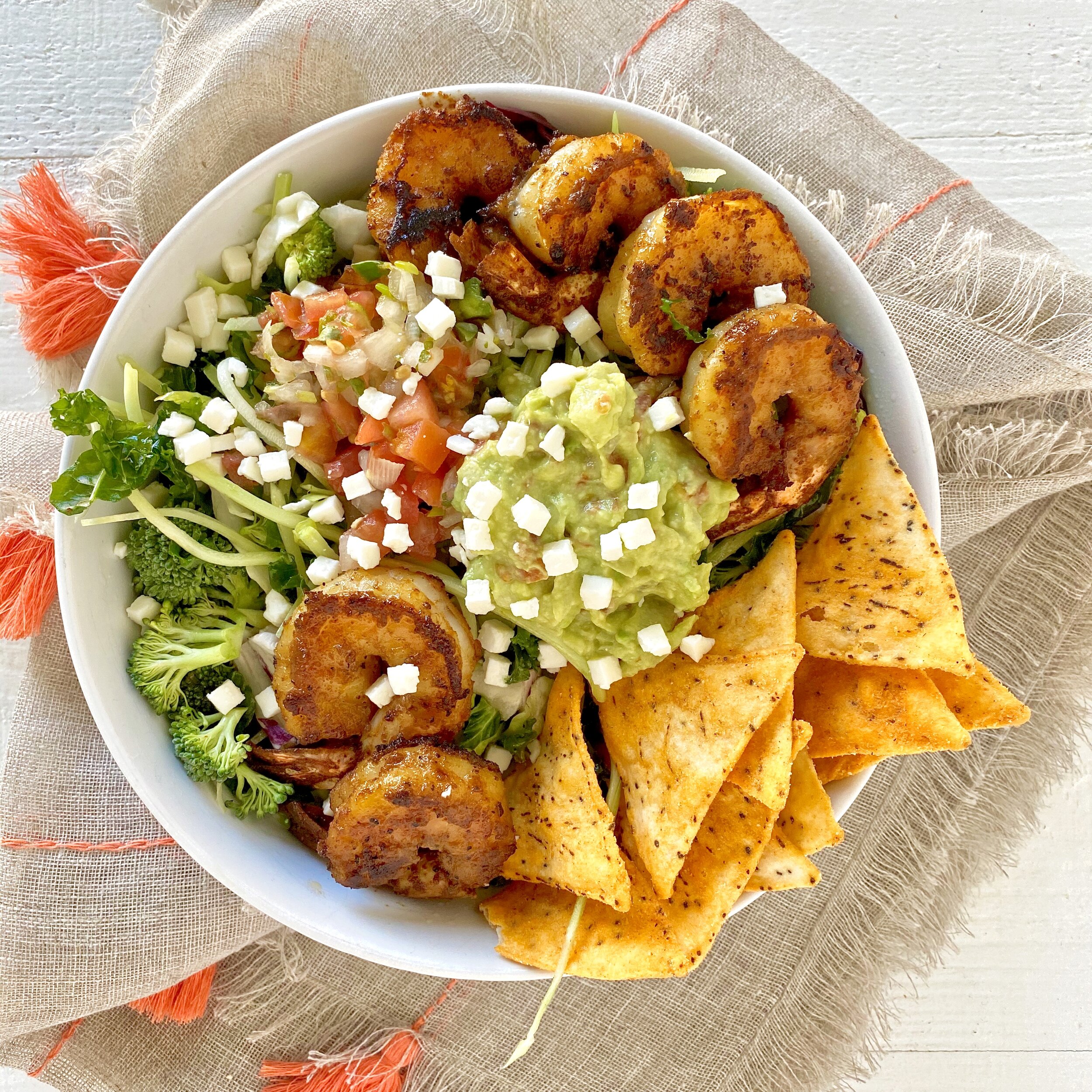 Blackened Shrimp and Veggie Taco Salad | Milk & Honey Nutrition Blackened Shrimp and Veggie Taco Salad in a bowl