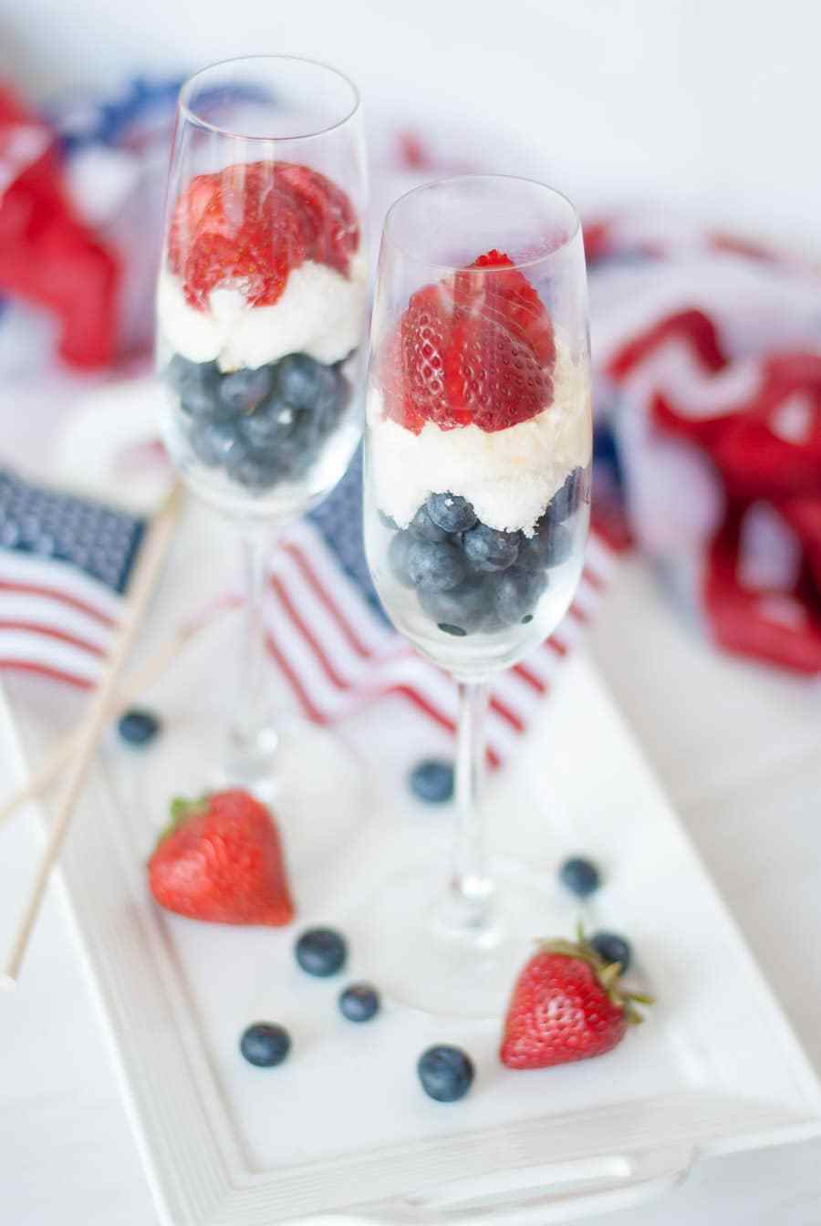  Easy Last Minute 4th of July Cookout Recipes; Pictured:  Patriotic Dessert Parfait with Summer Berries and Lemon Whipped Cream  by Champagne and Paper Planes 