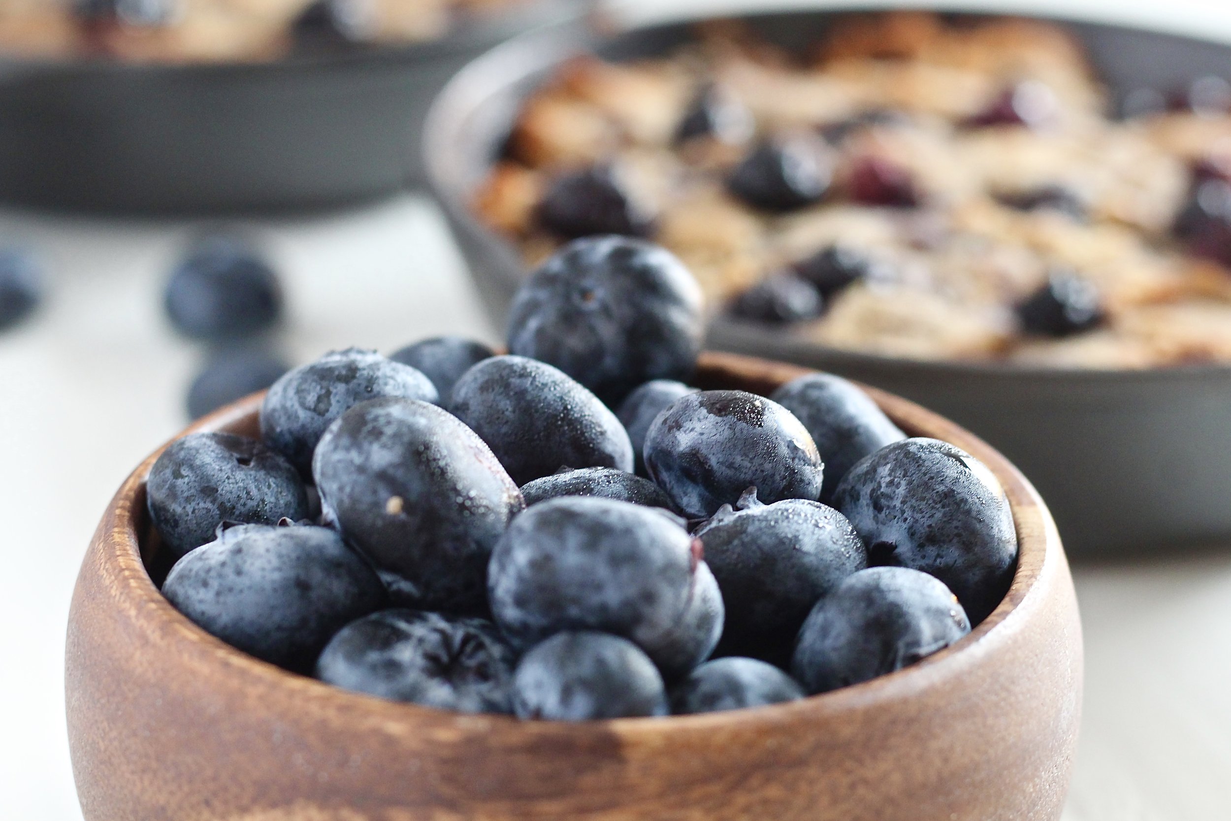 Grain Free Blueberry Lemon Breakfast Cookie Skillet with bowl of blueberries