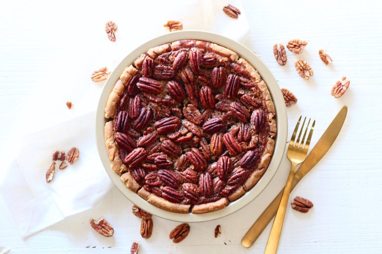 Lower Sugar Pecan Pie on table with pecans