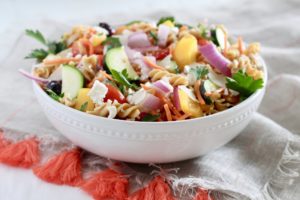 Mediterranean Veggie Pasta Salad in white bowl