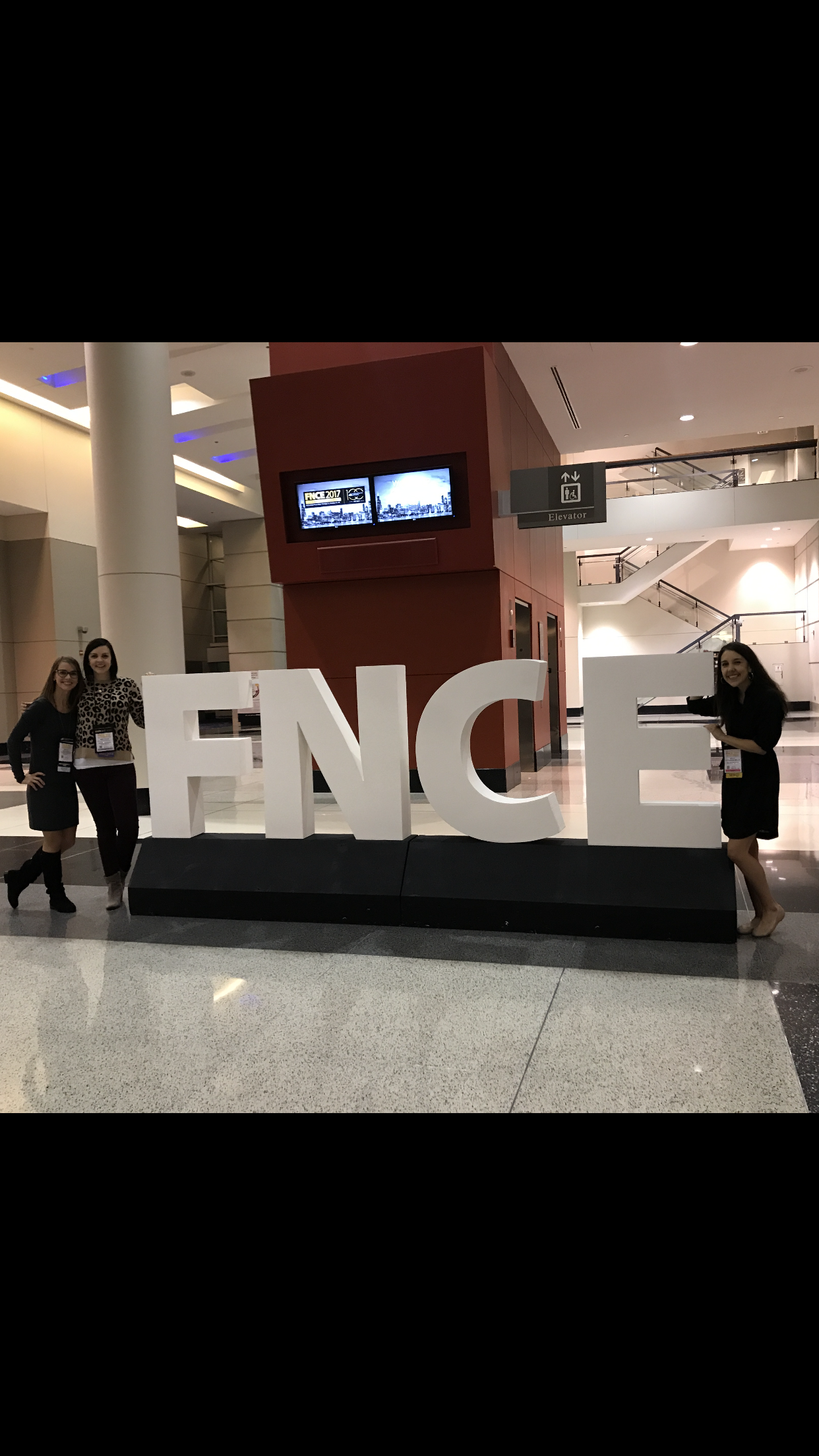 mary ellen phipps with colleagues at fnce in chicago