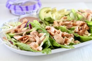 Salmon Lettuce Wraps with Spicy Black Bean Sauce on a plate