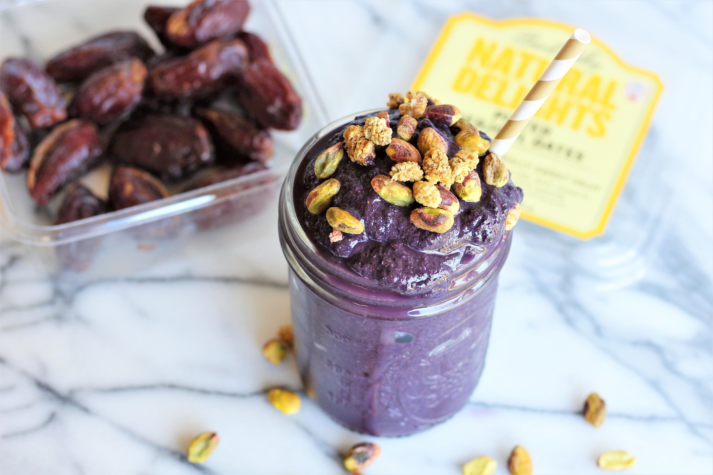 blueberry superfood smoothie with box of dates