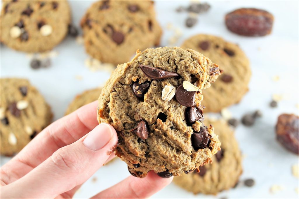 close up of oatmeal chocolate chip high protein cookies with a bite taken out