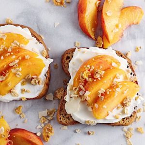 pieces of toast with peaches and cream