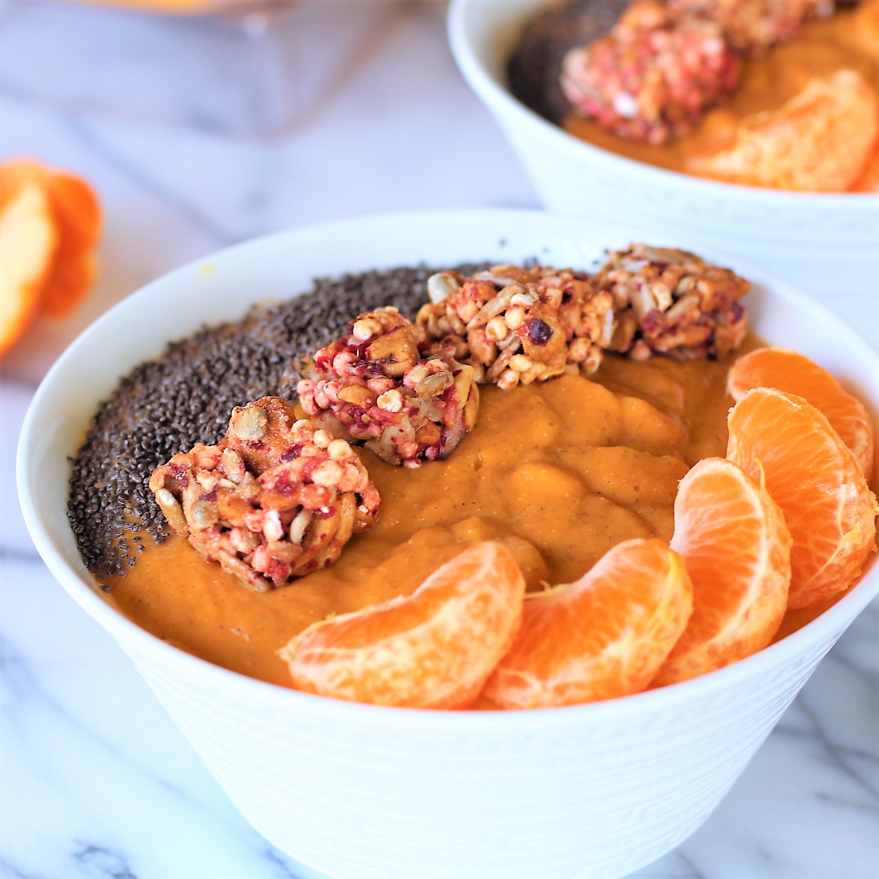  Sweet Potato Sunrise Smoothie topped off with mandarin oranges, Cashew Cranberry Orange Frontier Bites, and chia seeds.