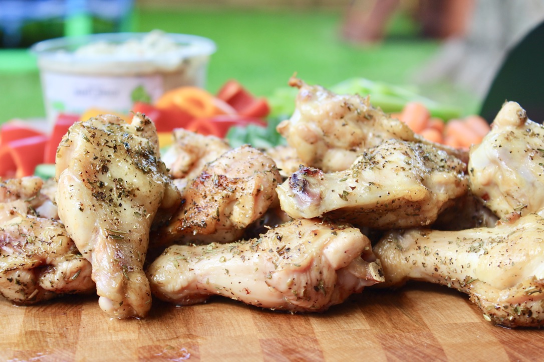 chicken wings on Traeger in backyard