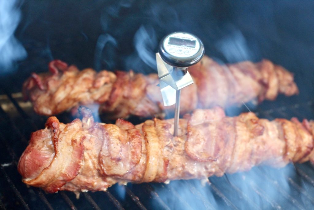 porktenderloin on grill with meat thermometer