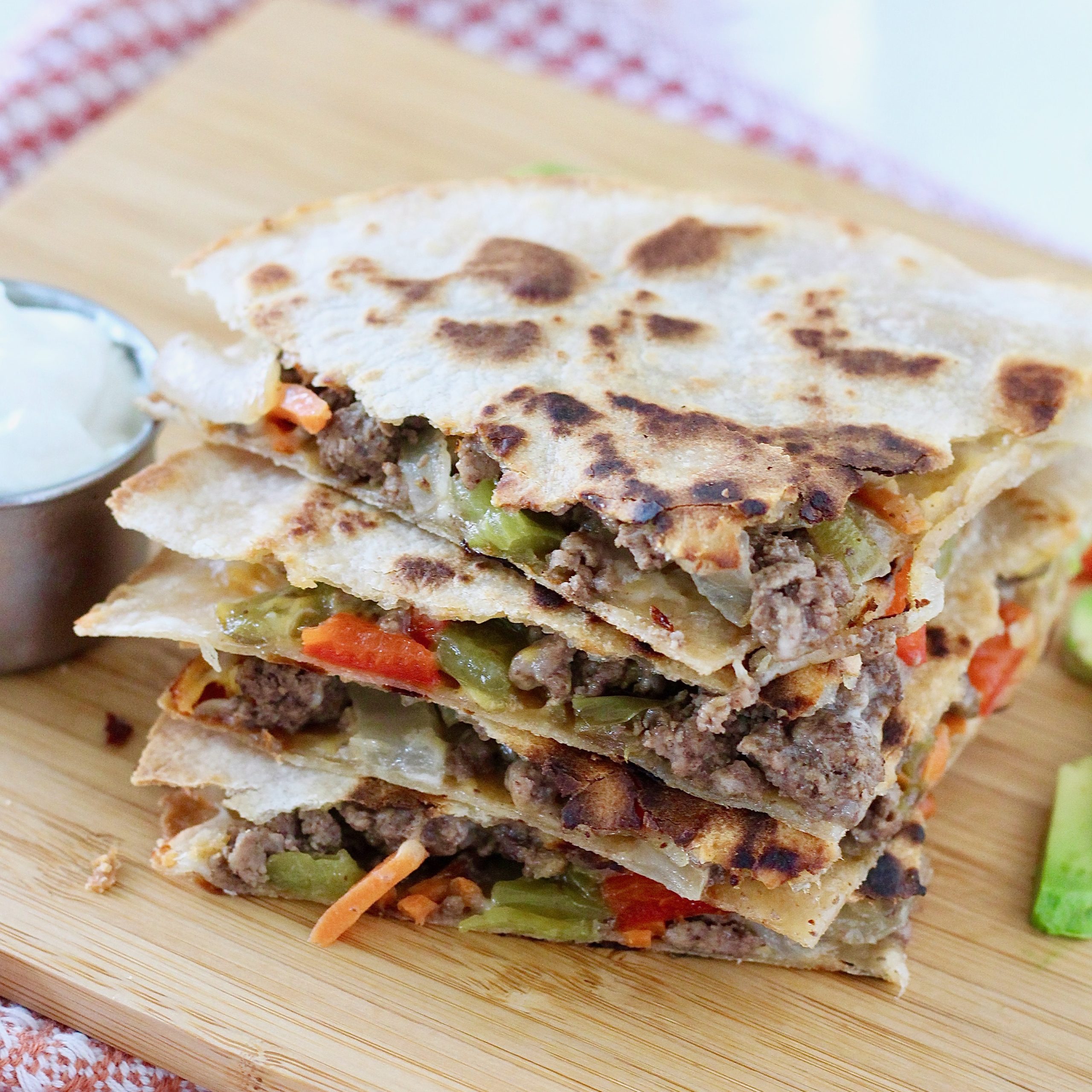 veggie and beef quesadillas with sour cream