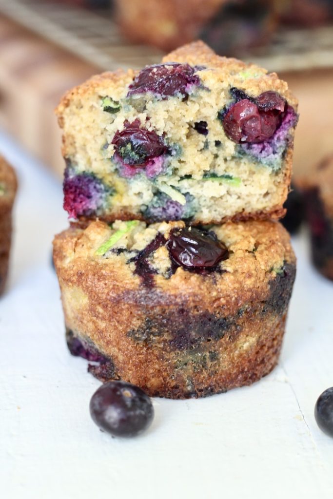 two blueberry zucchini muffins