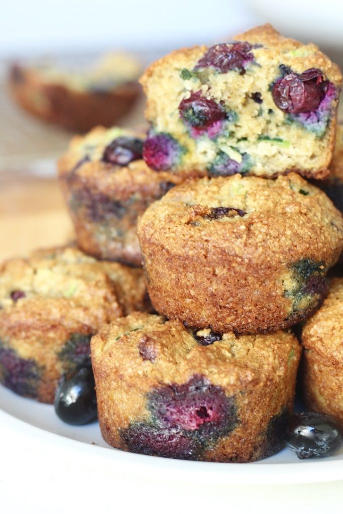 stack of blueberry zucchini muffins