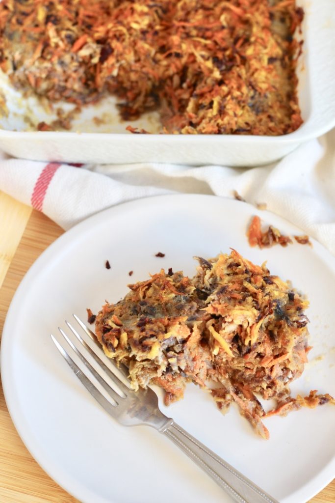 serving of carrot souffle with tri color carrots