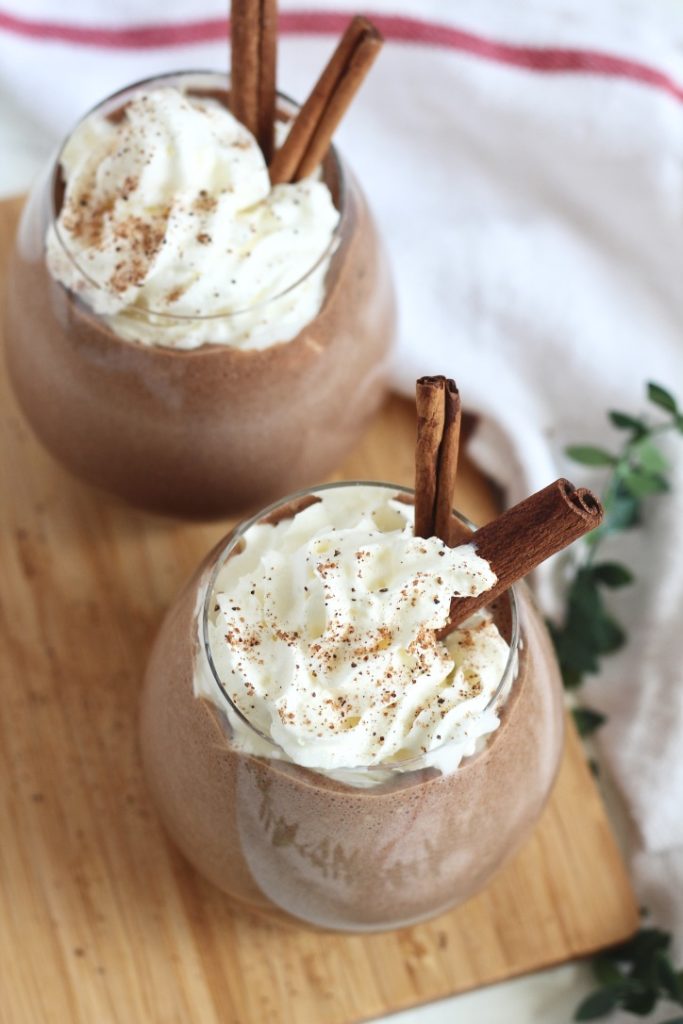 flatlay chocolate eggnog with whipped cream