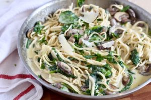 chickpea linguine with mushrooms and spinach in truffle mushroom pasta