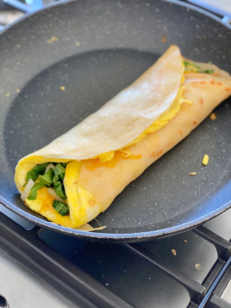 egg quesadilla folded in pan