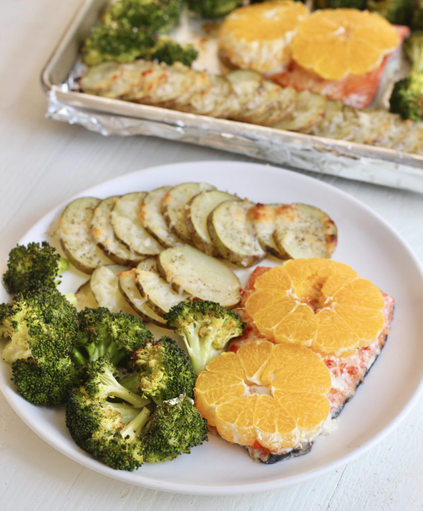 One pan salmon and veggies on plate 1 | Milk & Honey Nutrition citrus salmon with broccoli and potatoes one pan salmon and veggies