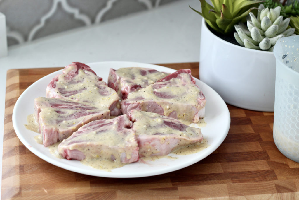 raw lamb loin chops with marinade