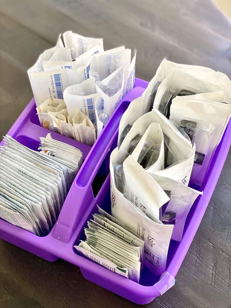 insulin pump supplies in purple craft caddy