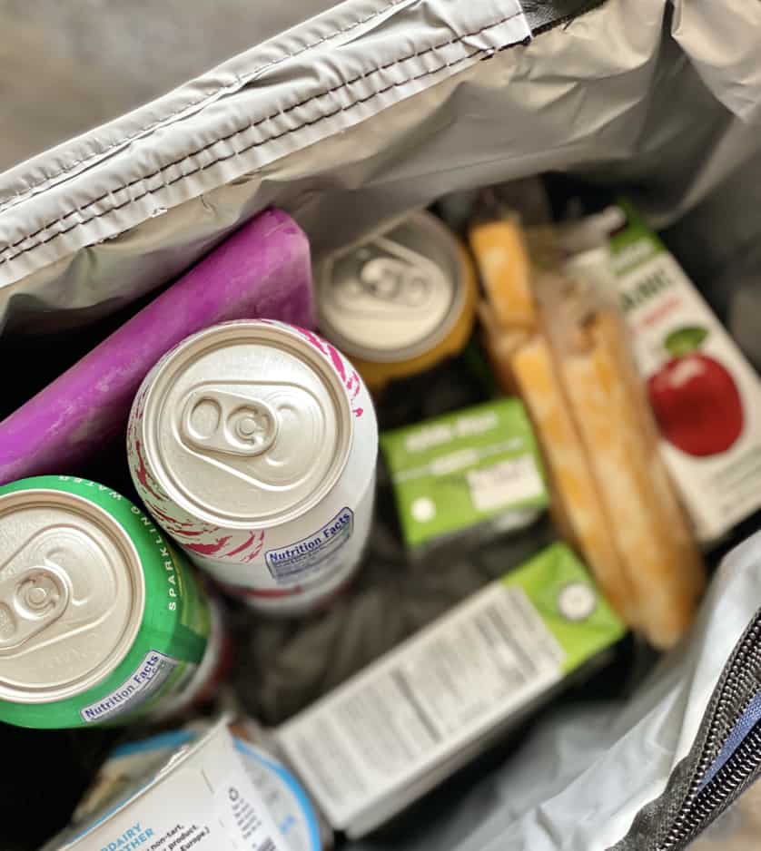 cooler packed with on the go diabetes snacks for roadtrip