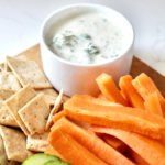 garli aioli with carrot sticks and cucumber slices