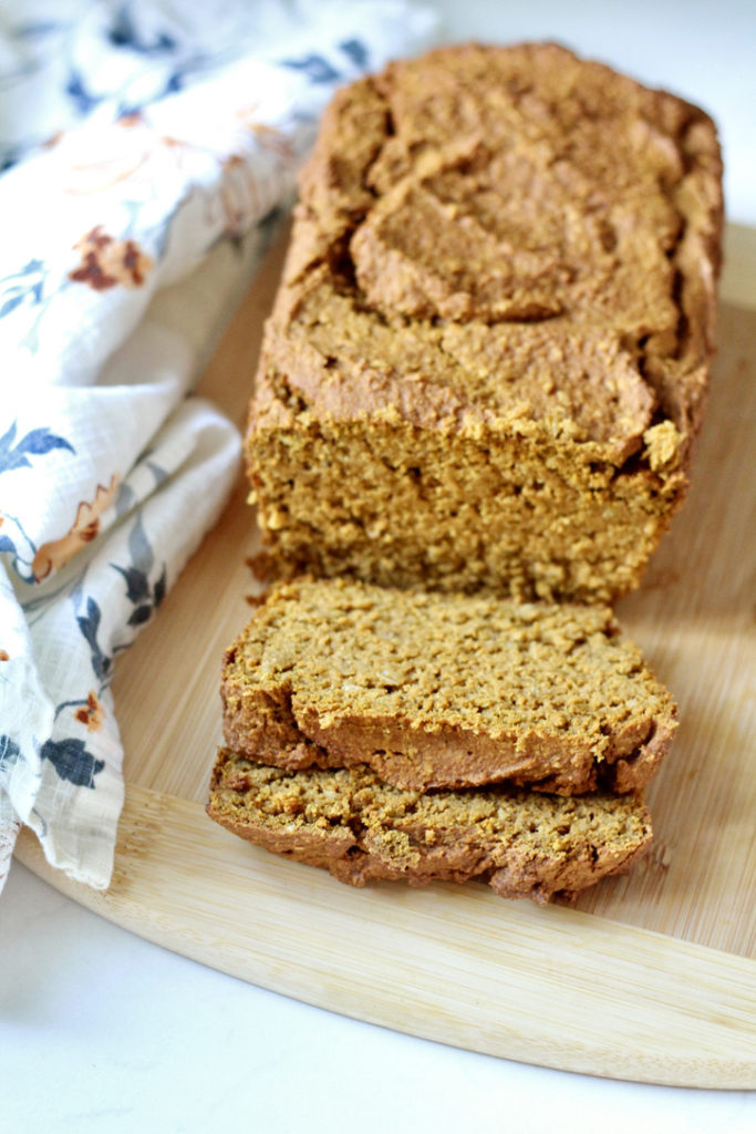 gluten free pumpkin bread 11 | Milk & Honey Nutrition gluten free pumpkin bread on wood cutting board
