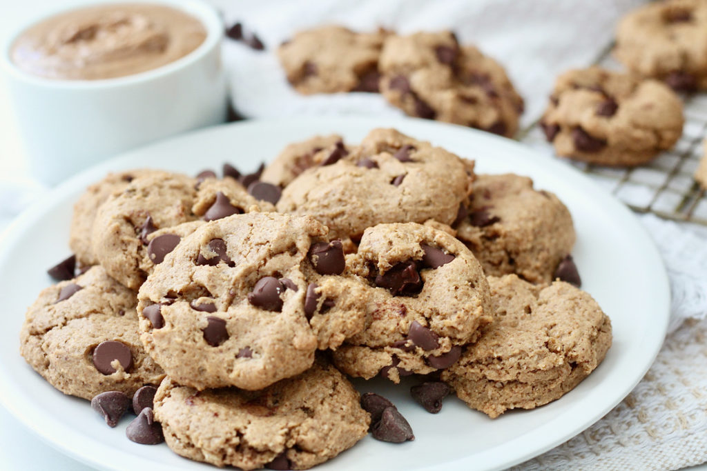 chocolate chip cookies on white plate with almond butter