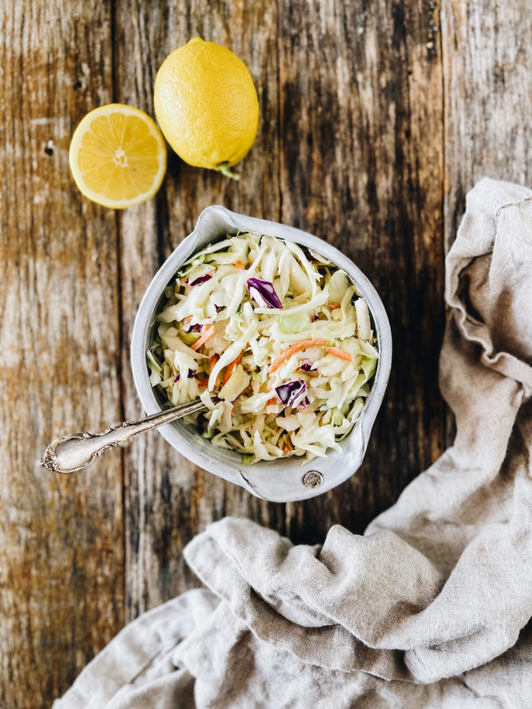 low carb coleslaw in white bowl