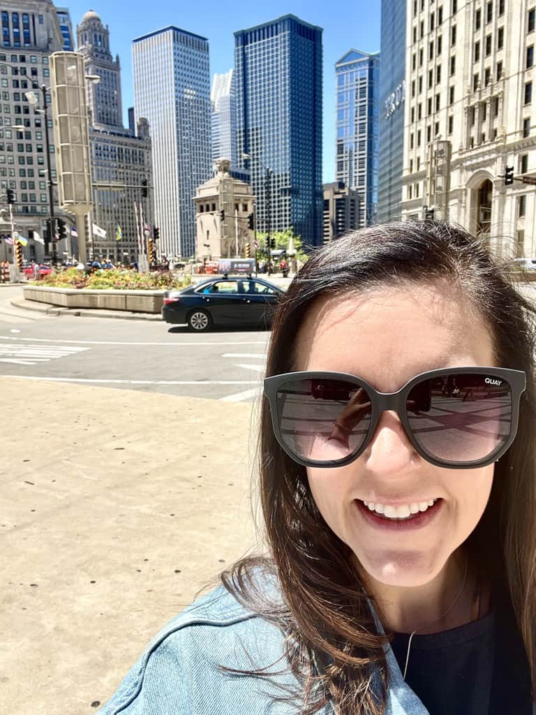 woman on chicago riverfront with quay sunglasses