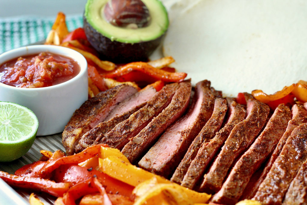 easy sheet pan steak fajitas with salsa avocado bell peppers