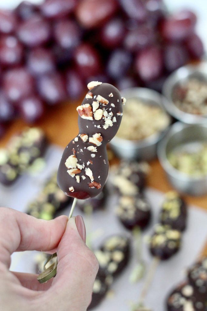 dark chocolate covered grapes on skewer