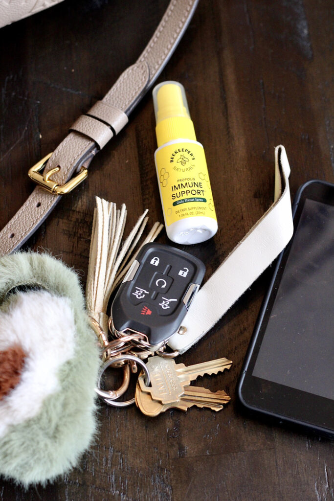 beekeepers naturals bee propolis throat spray with car keys and stuffed avocado