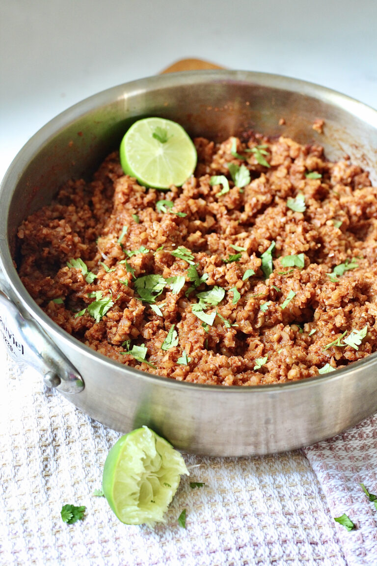 low carb mexican cauliflower rice in stainless steel pan
