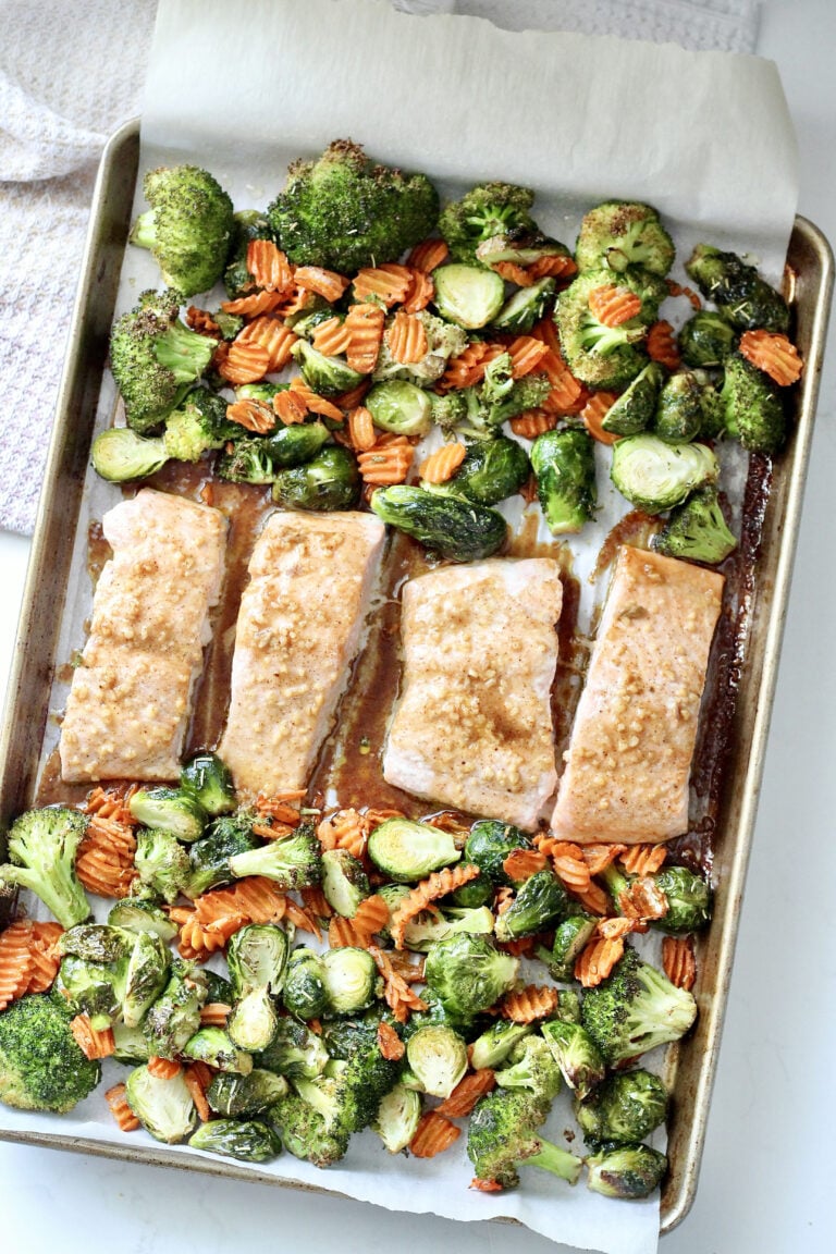 maple dijon roasted salmon 3 | Milk & Honey Nutrition maple dijon roasted salmon on a sheet pan with veggies