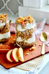 cinnamon apple greek yogurt parfait in glass jar