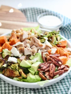 high protein chopped salad with sweet potatoes and brussel sprouts